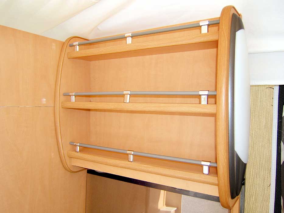 The storage rack in the kitchen area.